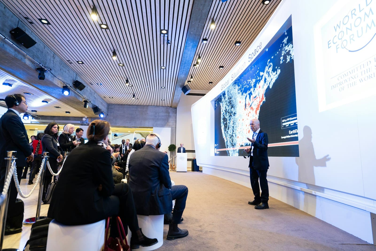 Corporate conference audience listening to speaker